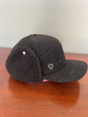 Black Speckled Earflap Trapper Cap with Shield Emblem
